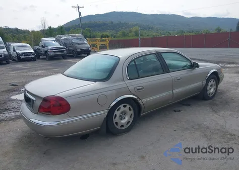 1999 Lincoln Continental из США, поврежденный, VIN 1LNHM97V2XY629957